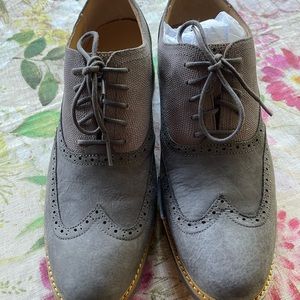 Men’s Wing-Tip Lace-Up by Cole Haan.